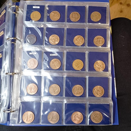 349 - A large group of GB coins, in six albums (6)...