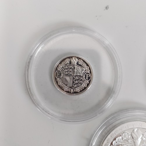 350 - Assorted commemorative silver crowns and other coins...