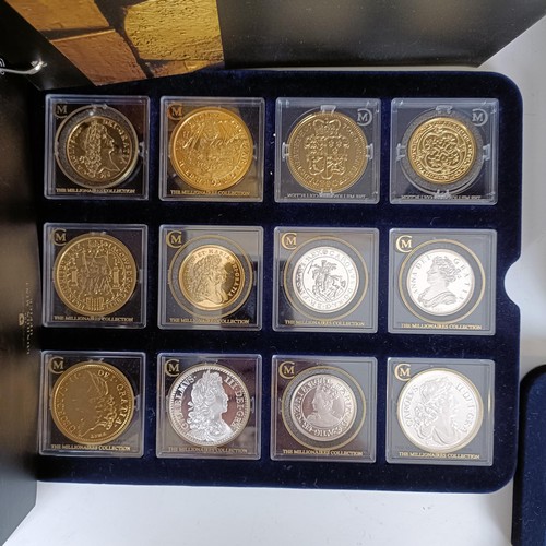 352 - A set of London Mint medallions, The Millionaires Collection, cased, with a file of information...