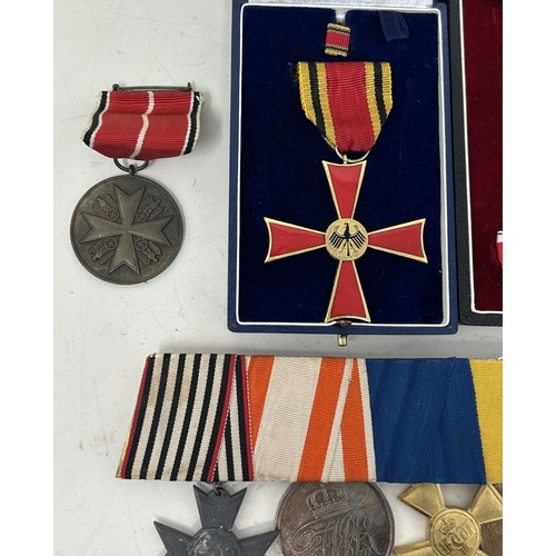 553 - The groups of German medals, awards and other items awarded to the Steffens family, covering many de... 