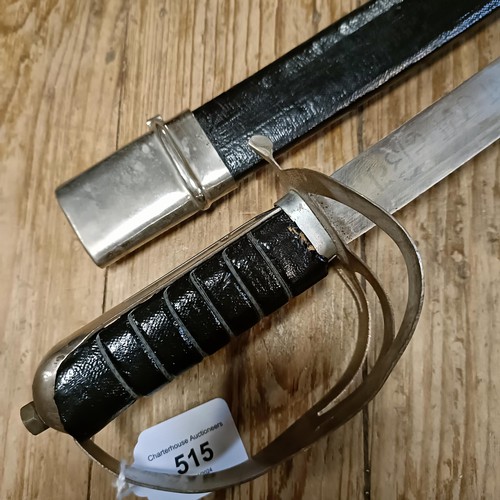 515 - A sabre, in a scabbard, 93 cm