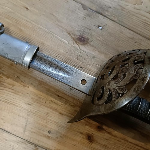 519 - A Victorian Infantry officer's sword, in a scabbard