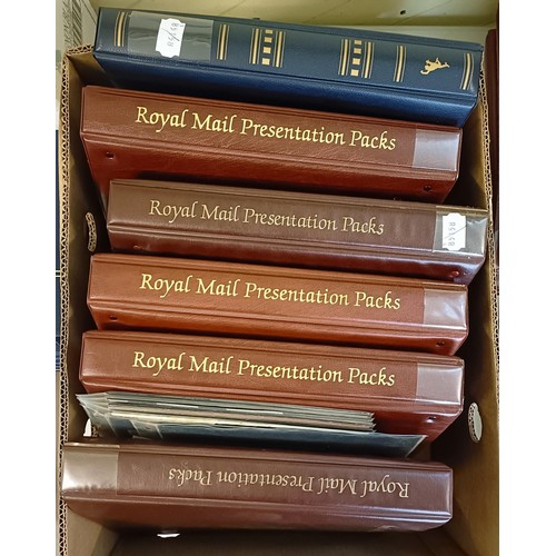 625 - A large group of Royal Mail presentation packs, in albums and loose, a small group of prestige bookl... 