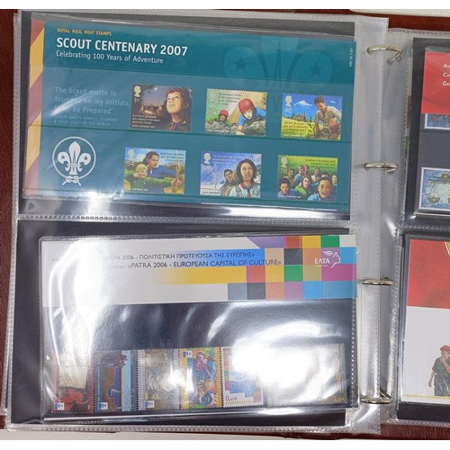 626 - Assorted Royal Mail presentation packs, in four albums