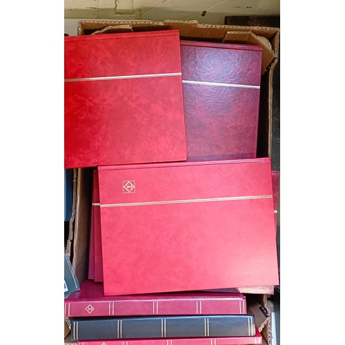 630 - A large group of world stamps, loose and in albums, and various presentation packs (4 boxes)