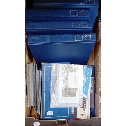 630 - A large group of world stamps, loose and in albums, and various presentation packs (4 boxes)