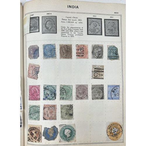 799 - Assorted world stamps, including a penny black, trimmed, in two Triumph albums (2)...