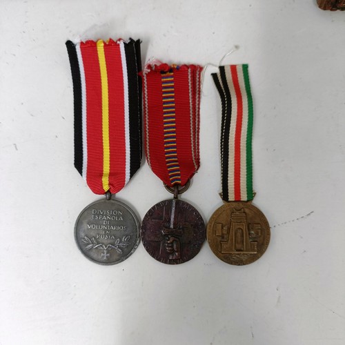 421 - A group of German medals, in two frames, and loose Provenance: On Instructions of the Family: Medals... 