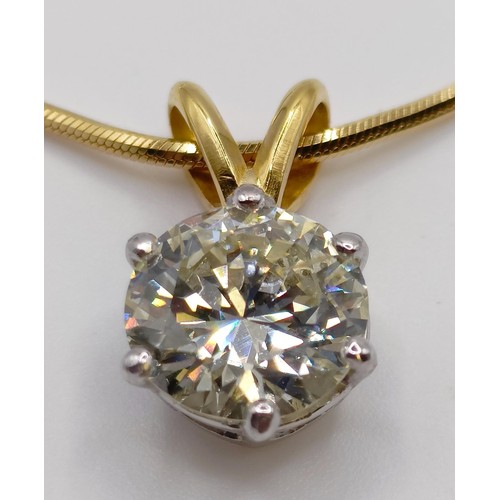 1602 - A 2ct diamond pendant, on an 18ct gold chain, with a white metal and diamond ring, which originally ... 