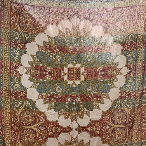 1058 - An Islamic shawl, decorated floral forms and script