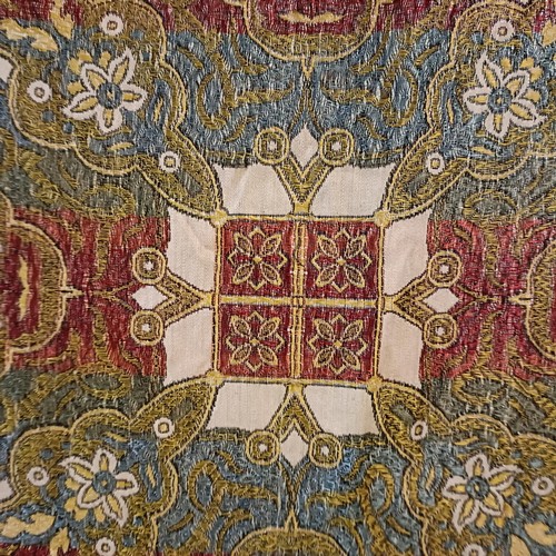 1058 - An Islamic shawl, decorated floral forms and script