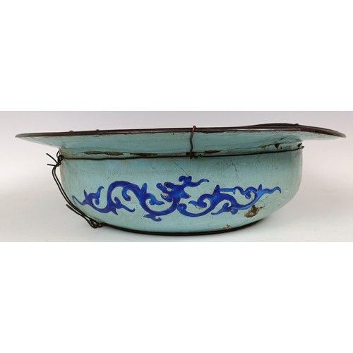 1065 - A Chinese enamel bowl, decorated flowers and butterflies, various losses, 42 cm diameter