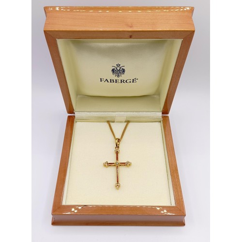 1613 - A modern Faberge 18ct gold, red enamel and diamond cross pendant with an 18ct gold chain, No F1897RT... 