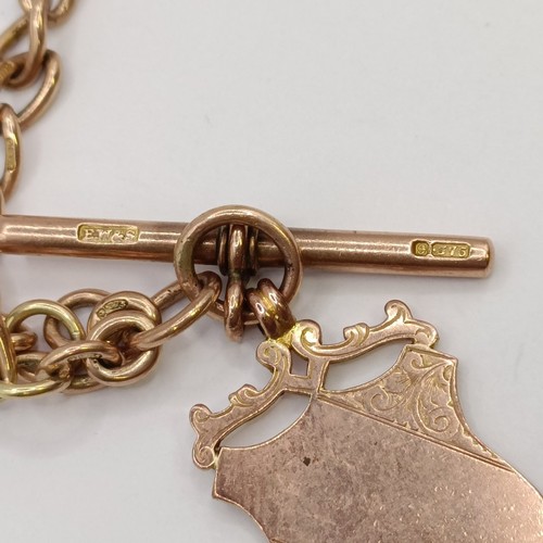 1619 - A 9ct rose gold Albert, with a fob, 26.9 g