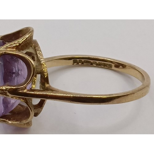 1616 - A 9ct gold and amethyst ring, ring size L, and another (2)