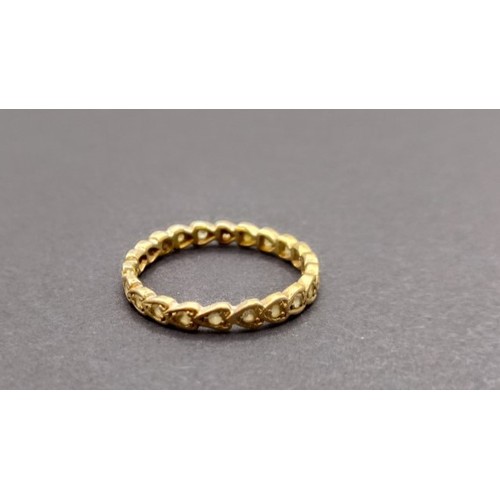 1628 - A yellow metal and white stone eternity ring, ring size S, and a white and yellow stone ring, inset ... 