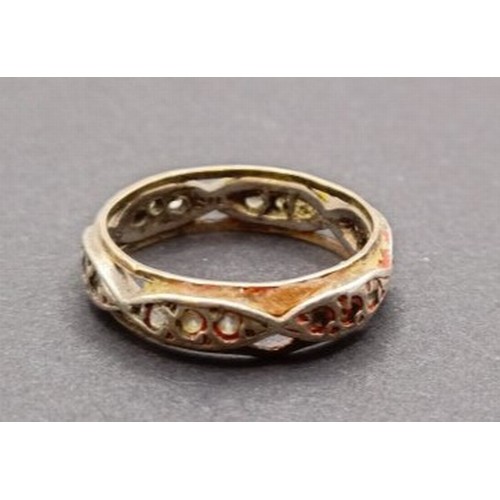 1628 - A yellow metal and white stone eternity ring, ring size S, and a white and yellow stone ring, inset ... 