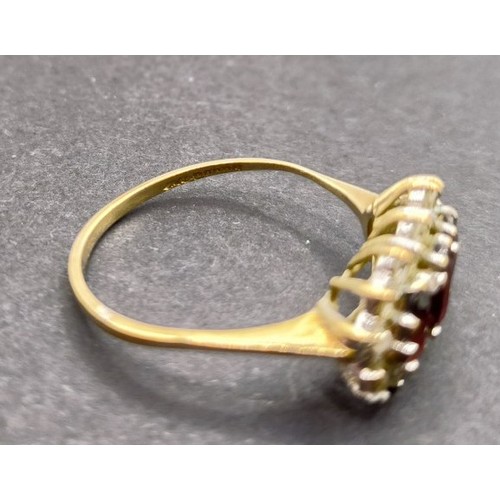 1634 - A yellow metal, red and white stone dress ring, ring size T, and another, ring size T (2)