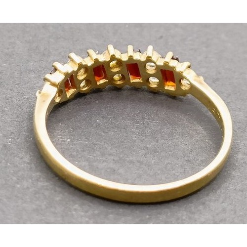 1634 - A yellow metal, red and white stone dress ring, ring size T, and another, ring size T (2)