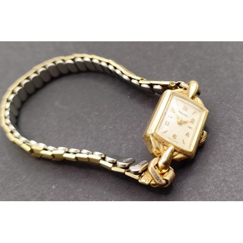 1672 - A ladies 9ct gold Rotary wristwatch, on a gold plated expandable strap