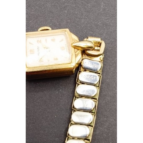 1672 - A ladies 9ct gold Rotary wristwatch, on a gold plated expandable strap