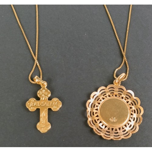 1687 - An 18ct gold pendant, on an 18ct gold chain, and yellow metal pendant cross, 10 g (all in)