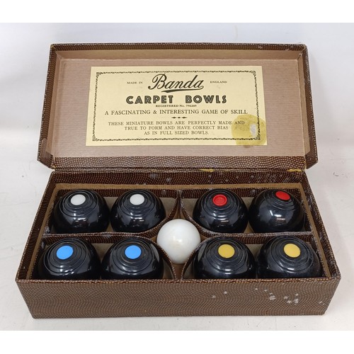 1078 - A B&A carpet bowls set, an Indian multi-coloured brown box, assorted photograph frames, a painte... 