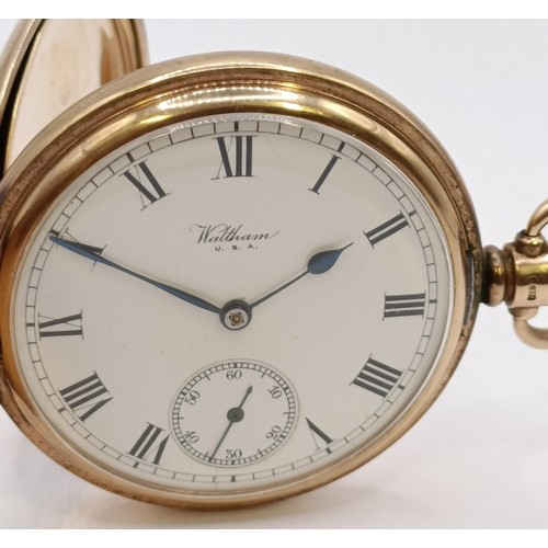 1690 - A 9ct gold Waltham half hunter pocket watch