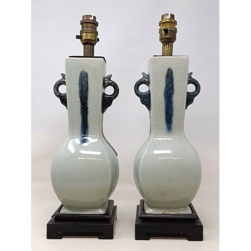 1081 - A pair of Chinese vases, converted to table lamps, 34 cm high (2)