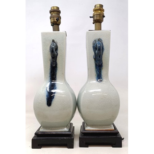 1081 - A pair of Chinese vases, converted to table lamps, 34 cm high (2)