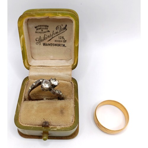 1696 - A 22ct gold wedding band, ring size P, 4.7 g and a dress ring, in a vintage jewellery box (2)