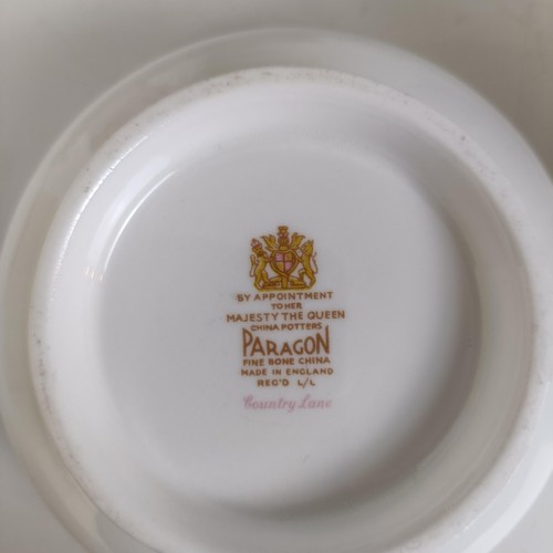 1088 - A Paragon part tea and dinner service, a Spode limited edition plate, a map and a group of cricket r... 