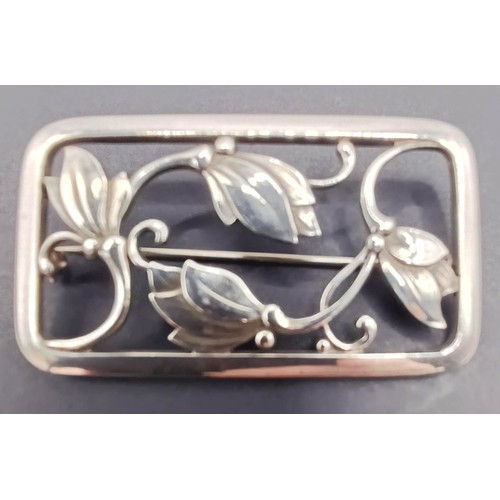 1715 - A Georg Jensen silver brooch, decorated flowers, 16.4 g