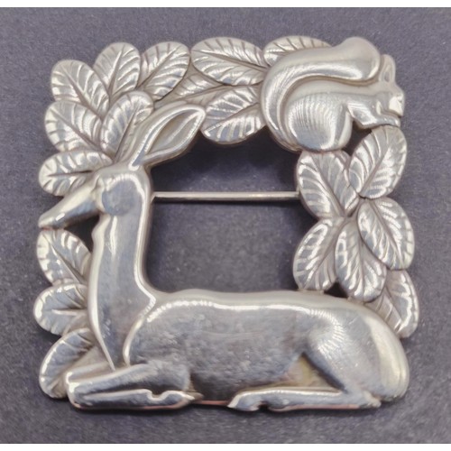 1718 - A Georg Jensen silver brooch, decorated deer and squirrel, 22.2 g