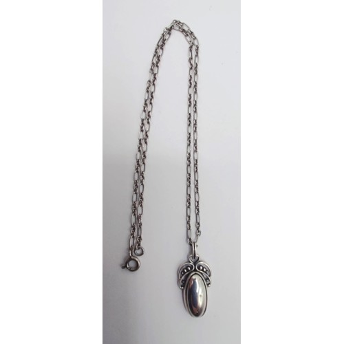 1723 - A Georg Jensen silver pendant, on a chain, 11.7 g