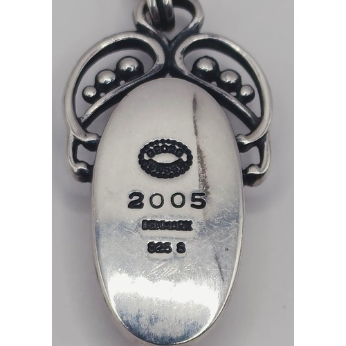 1723 - A Georg Jensen silver pendant, on a chain, 11.7 g