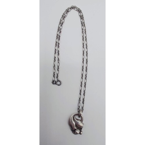 1724 - A George Jensen silver pendant, on a chain, 12.8 g