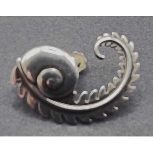 1726 - A Georg Jensen single earring, decorated a snail and leaf, and a Georg Jensen style silver bracelet,... 