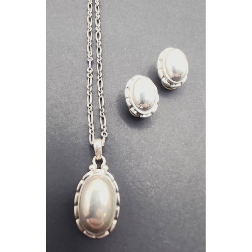 1728 - A Georg Jensen silver pendant, and a pair of matching earrings, 20 g