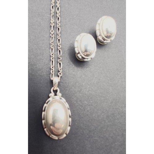 1728 - A Georg Jensen silver pendant, and a pair of matching earrings, 20 g