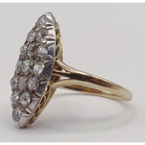 1736 - A marquis shaped diamond cluster ring, ring size O