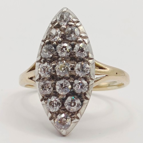 1736 - A marquis shaped diamond cluster ring, ring size O