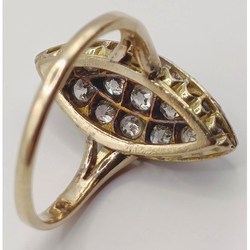 1736 - A marquis shaped diamond cluster ring, ring size O