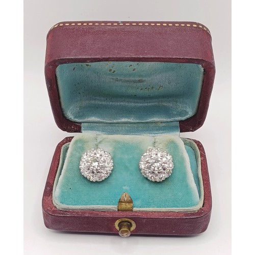 1737 - A pair of diamond cluster stud earrings, in a vintage jewellery box