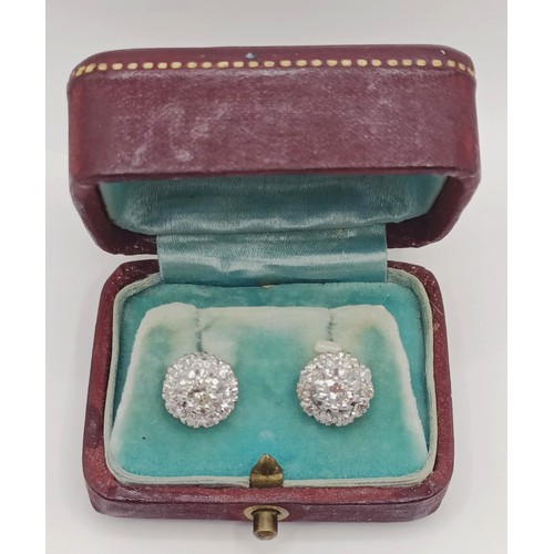 1737 - A pair of diamond cluster stud earrings, in a vintage jewellery box