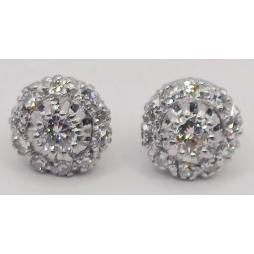 1737 - A pair of diamond cluster stud earrings, in a vintage jewellery box