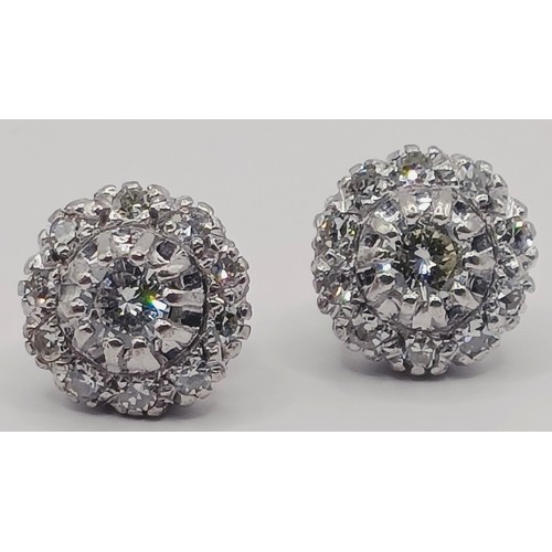 1737 - A pair of diamond cluster stud earrings, in a vintage jewellery box