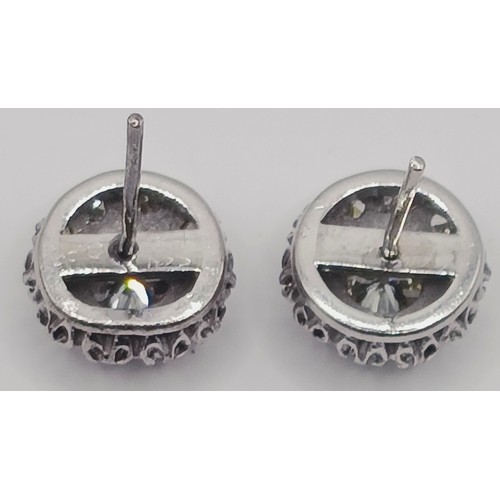 1737 - A pair of diamond cluster stud earrings, in a vintage jewellery box