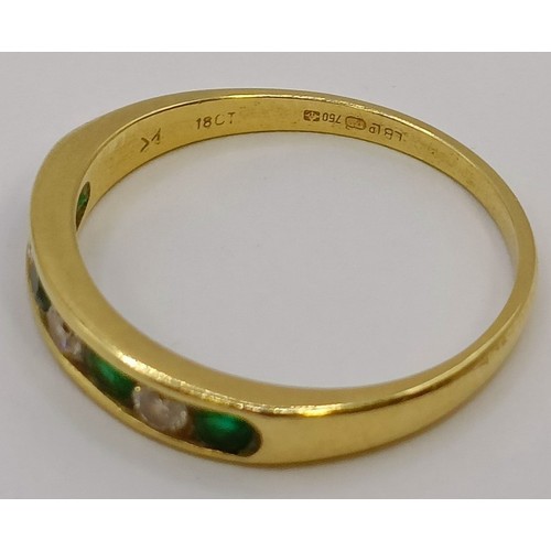 1747 - An 18ct gold, diamond and emerald half hoop ring, ring size M