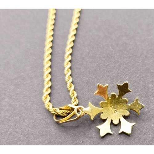 1772 - A 15ct gold and seed pearl snowflake pendant, on a 15ct gold chain, 9 g (all in)